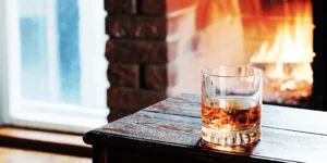 Smooth whiskey in a glass with ice.