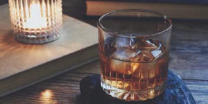 The right way to drink whiskey on the rocks, served in a glass with one large, clear ice cube.