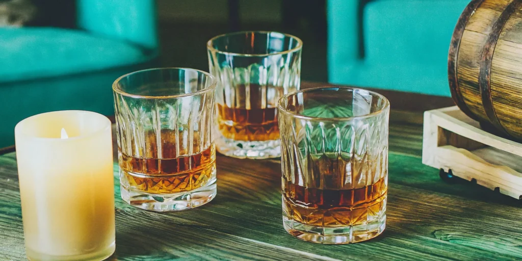 Three glasses of some of the smoothest whiskeys under $50 for easy sipping.