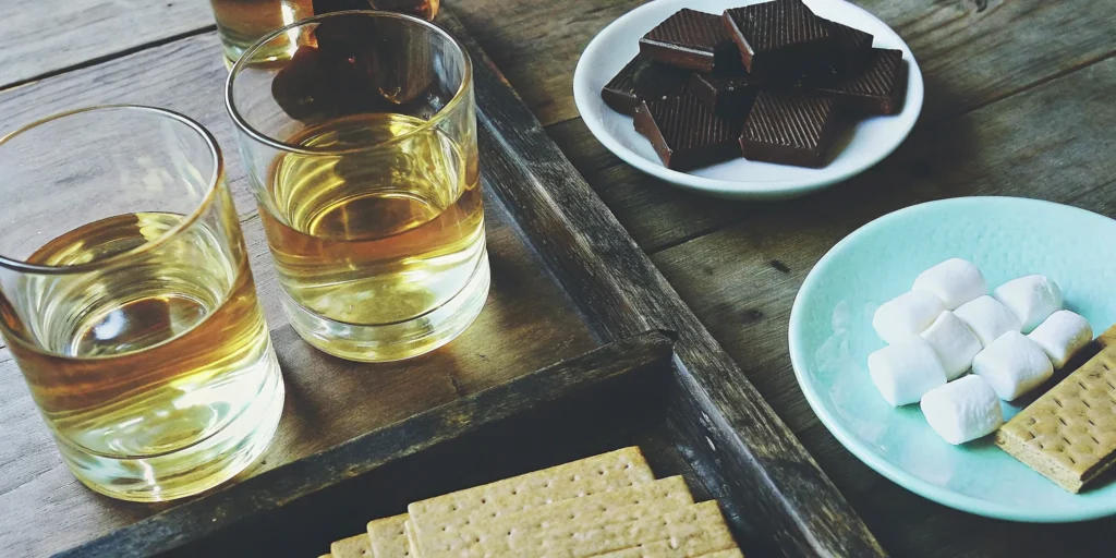 S'mores ingredients like chocolate and marshmallows are a creative mix for chocolate whiskey.