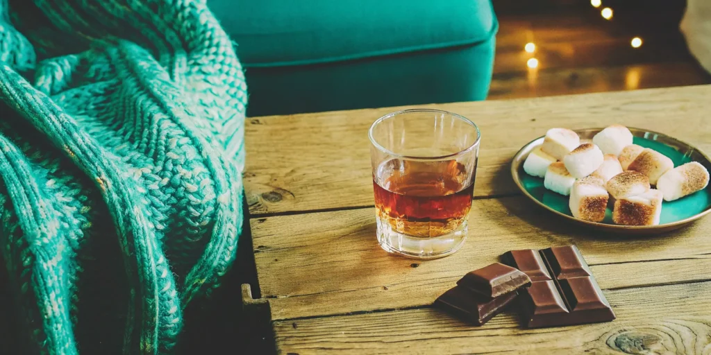 How to drink Mash & Mallow whiskey, served with chocolate and toasted marshmallows.