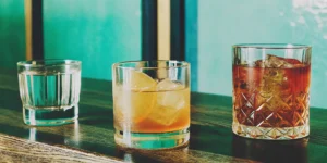How to drink flavored whiskey, served in three glasses neat and on the rocks.