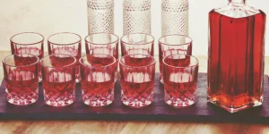 Shot glasses filled with smooth whiskey for shooting.