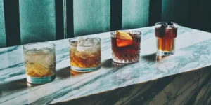 Four make ahead bourbon cocktails batched and ready for easy hosting.