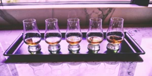 Several glasses of smooth scotch for beginners arranged for a tasting.