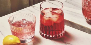 How to mix scotch into simple cocktails like these two with ice and lemon.