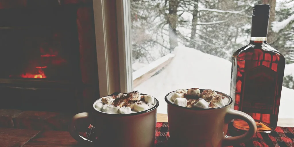 Boozy hot chocolate with toasted marshmallows and s'mores whiskey